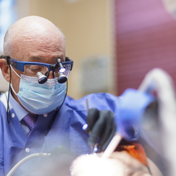 Doctor Mohr giving a patient a dental exam
