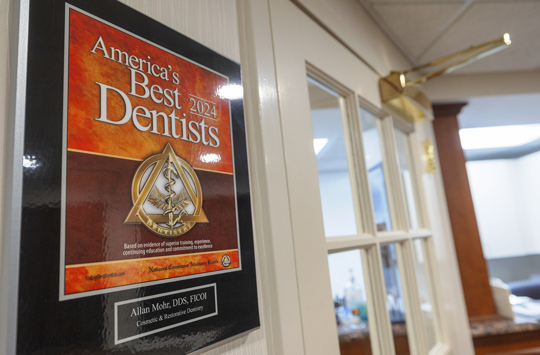 Framed Americas Best Dentists 2024 award on the wall