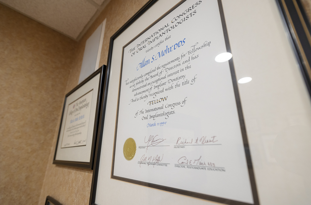 Framed certificate for Doctor Allan S Mohr as a Fellow of the International Congress of Oral Implantologists